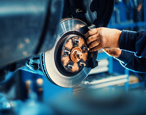 Workforce employee working on machinery